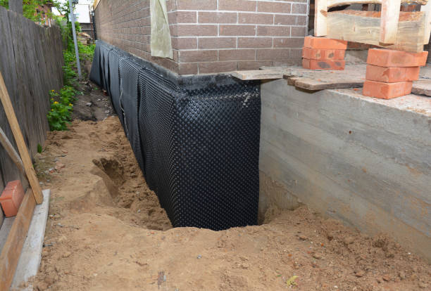 Happy homeowners after waterproofing job in Union Bridge
